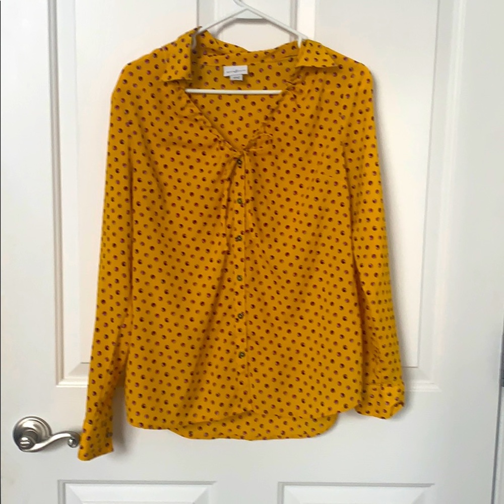 Purple and yellow polka dot blouse